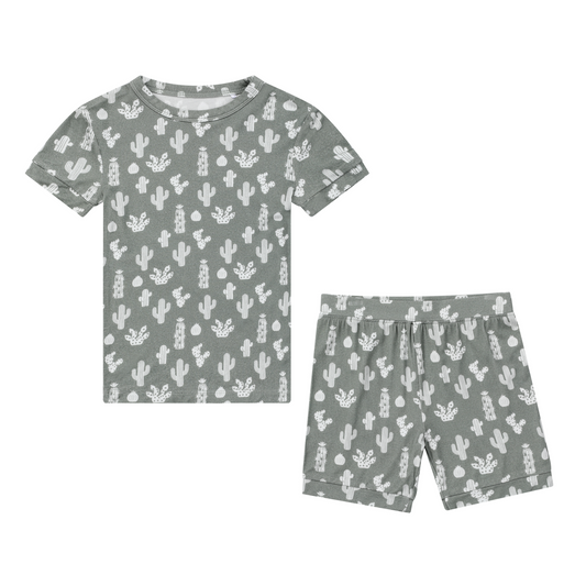 the "stay sharp" 2-piece matching pajama set. the "stay sharp" print is a variety of different white cacti on a greyish/green background. 