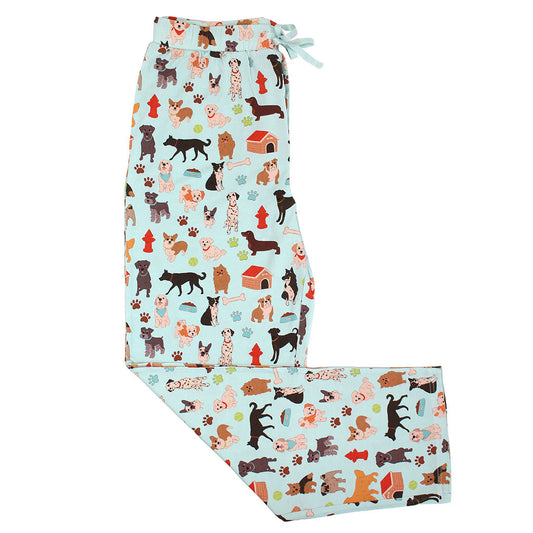 the "dogs bark" relaxed pants. the "dogs bark" print is a mix of various types of dogs, dog houses, dog bones, paw prints, dog food, and tennis balls scattered around a light blue background.