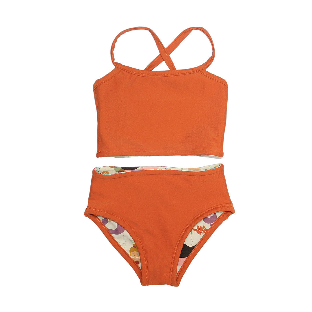 the reversed version of the "making waves" reversible bikini. this is in a burnt red/orange color. 