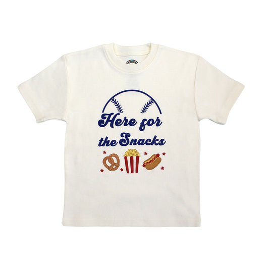 the "here for the snacks" cotton t-shirt. this design has the phrase "here for the snacks" written across it. theres also half a baseball covering it and a pretzel, popcorn, and a hotdog on the bottom. 