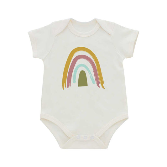 the "rainbow" baby cotton onesie. a white onesie with a boho yellow, pink, teal, olive green rainbow. 