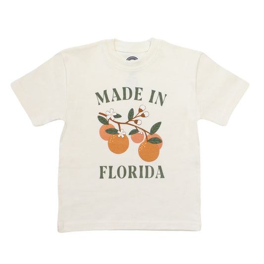 the "made in Florida" cotton t-shirt. this cotton t-shirt has the phrase "made in Florida" in green print on the onesie. there is also a branch of oranges on it too. 