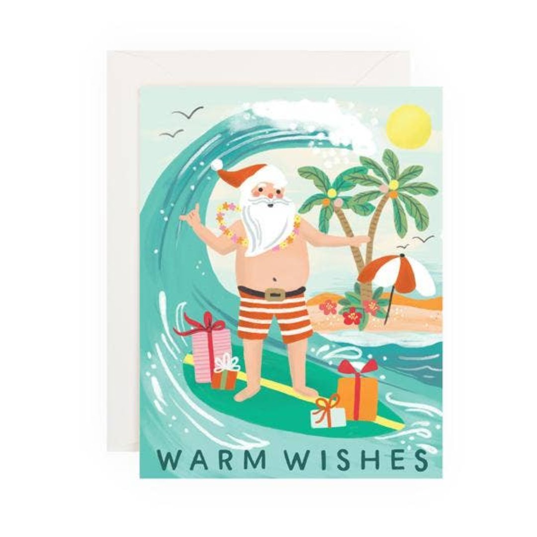 surfing santa card that says warm wishes