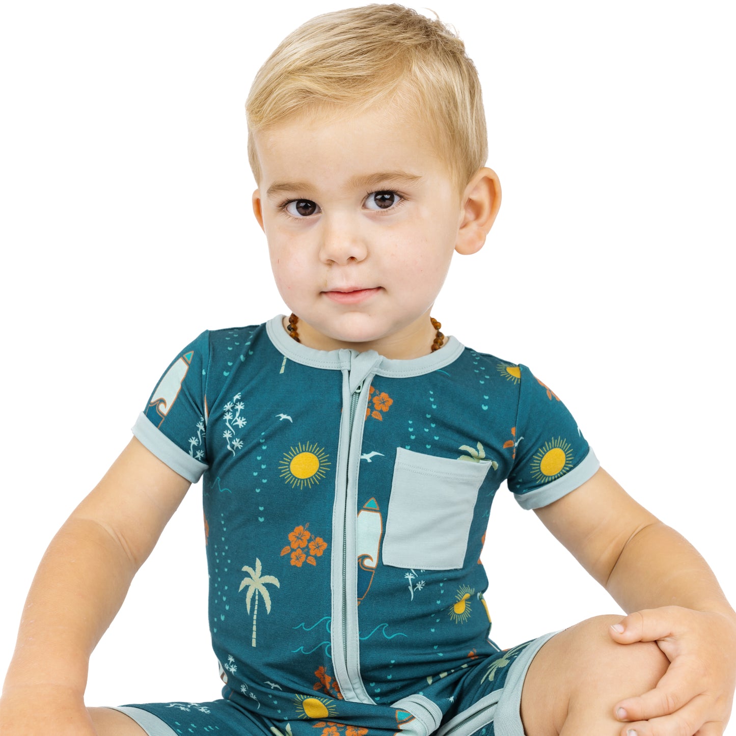 Close-up of Surf’s Up bamboo shortie romper with zipper and pocket