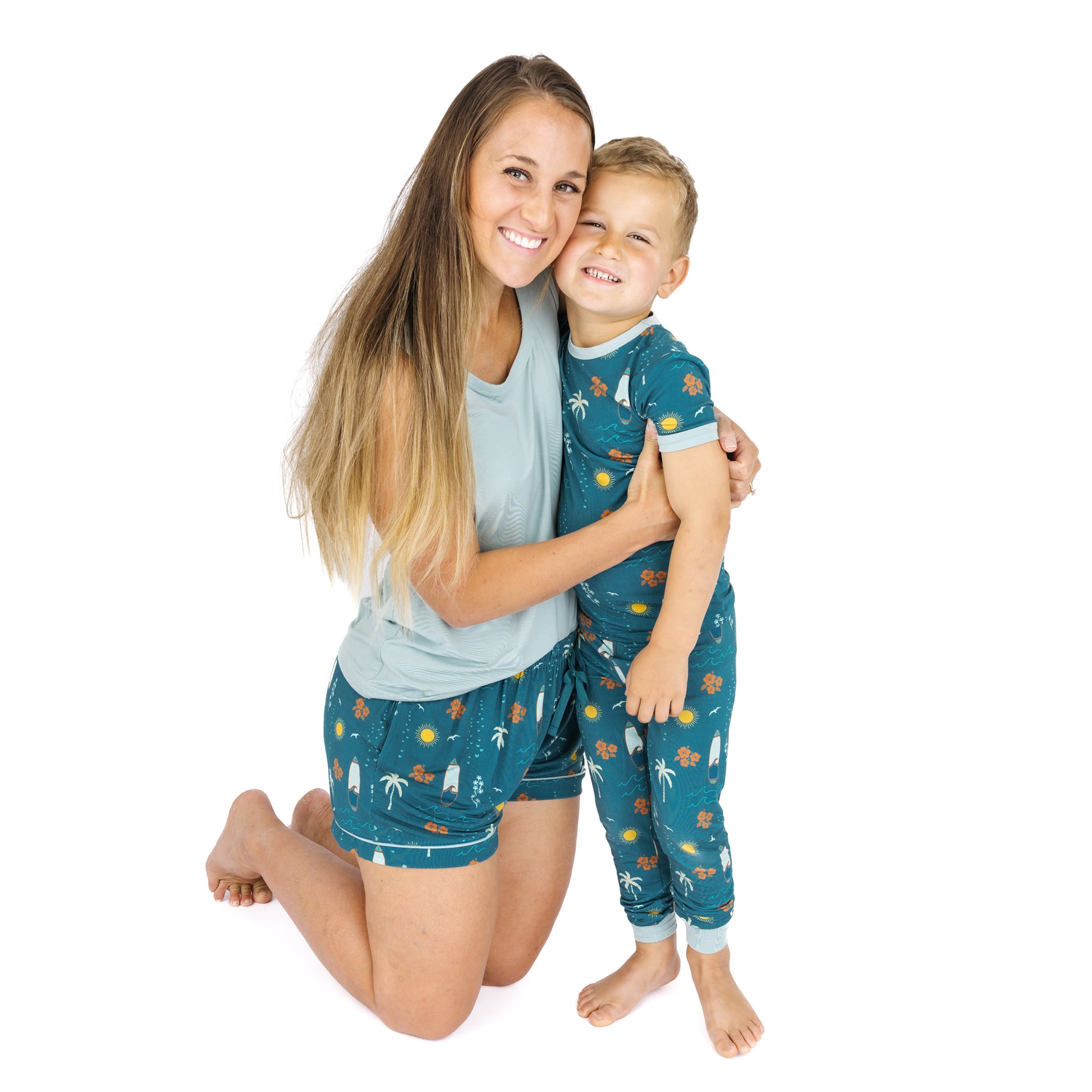 Mom and child wearing Surf’s Up matching bamboo pajamas