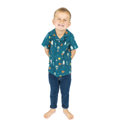 Boy wearing Surf’s Up button down shirt with jeans full outfit