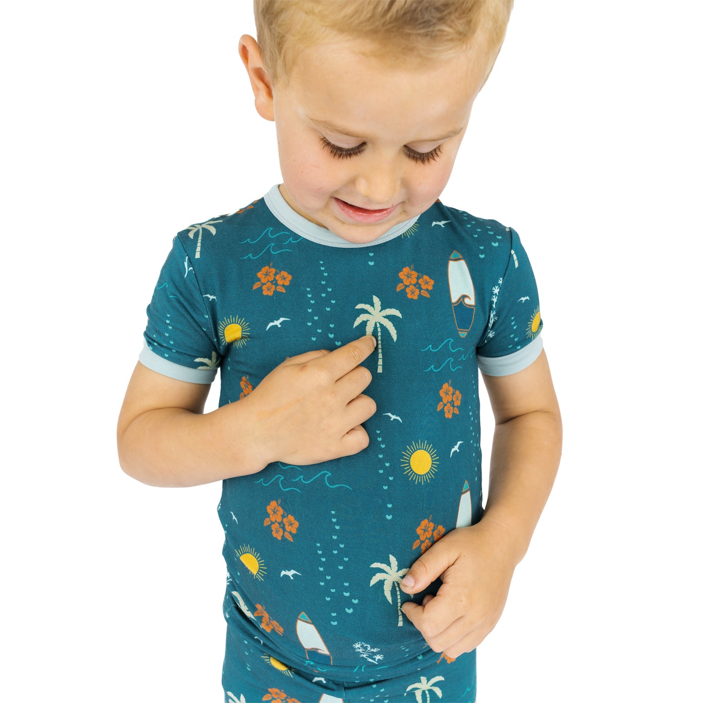 Close-up of Surf’s Up bamboo pajama top with surf print