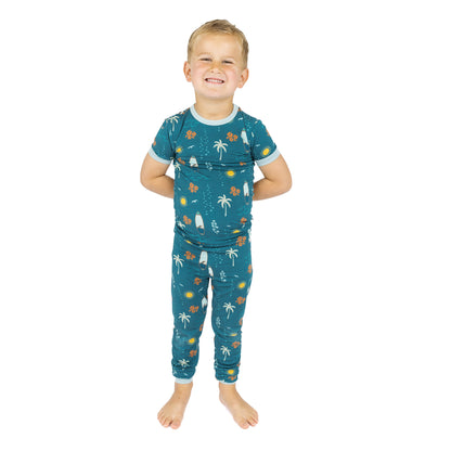 Child wearing Surf’s Up bamboo pajamas standing