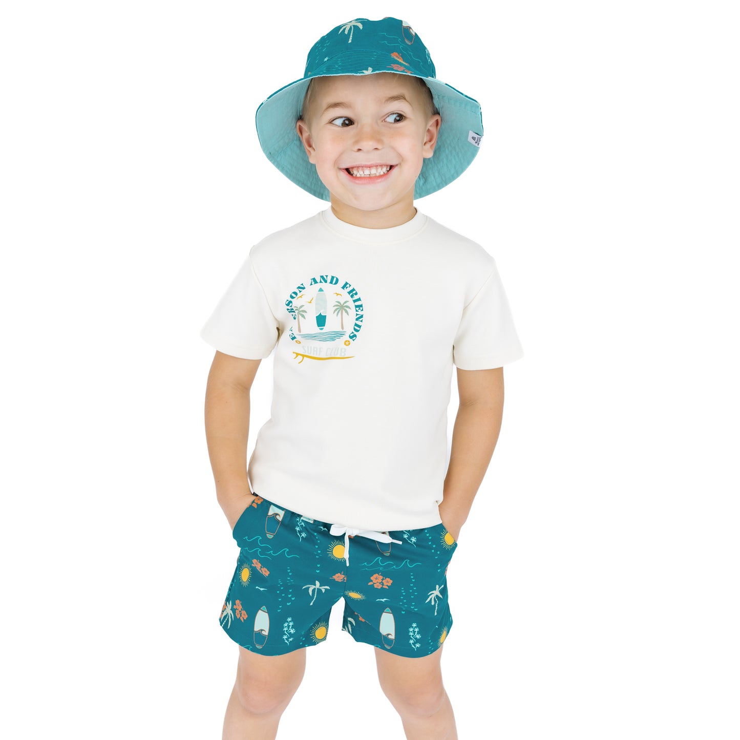 Child wearing Surf’s Up bucket hat with matching outfit