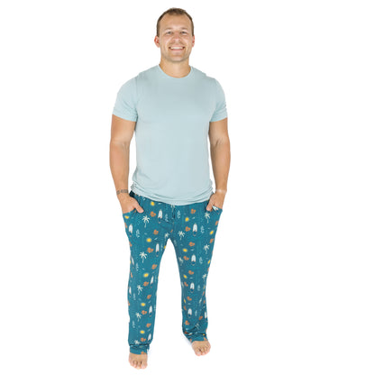 Man wearing Surf’s Up bamboo pajama pants full body view