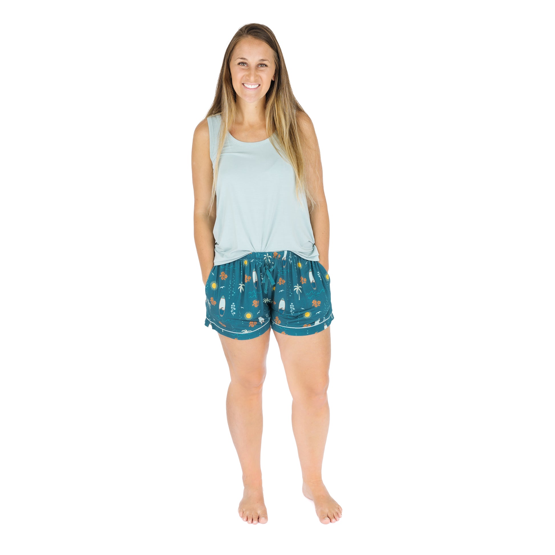 Woman wearing Surf’s Up bamboo pajama shorts full body view