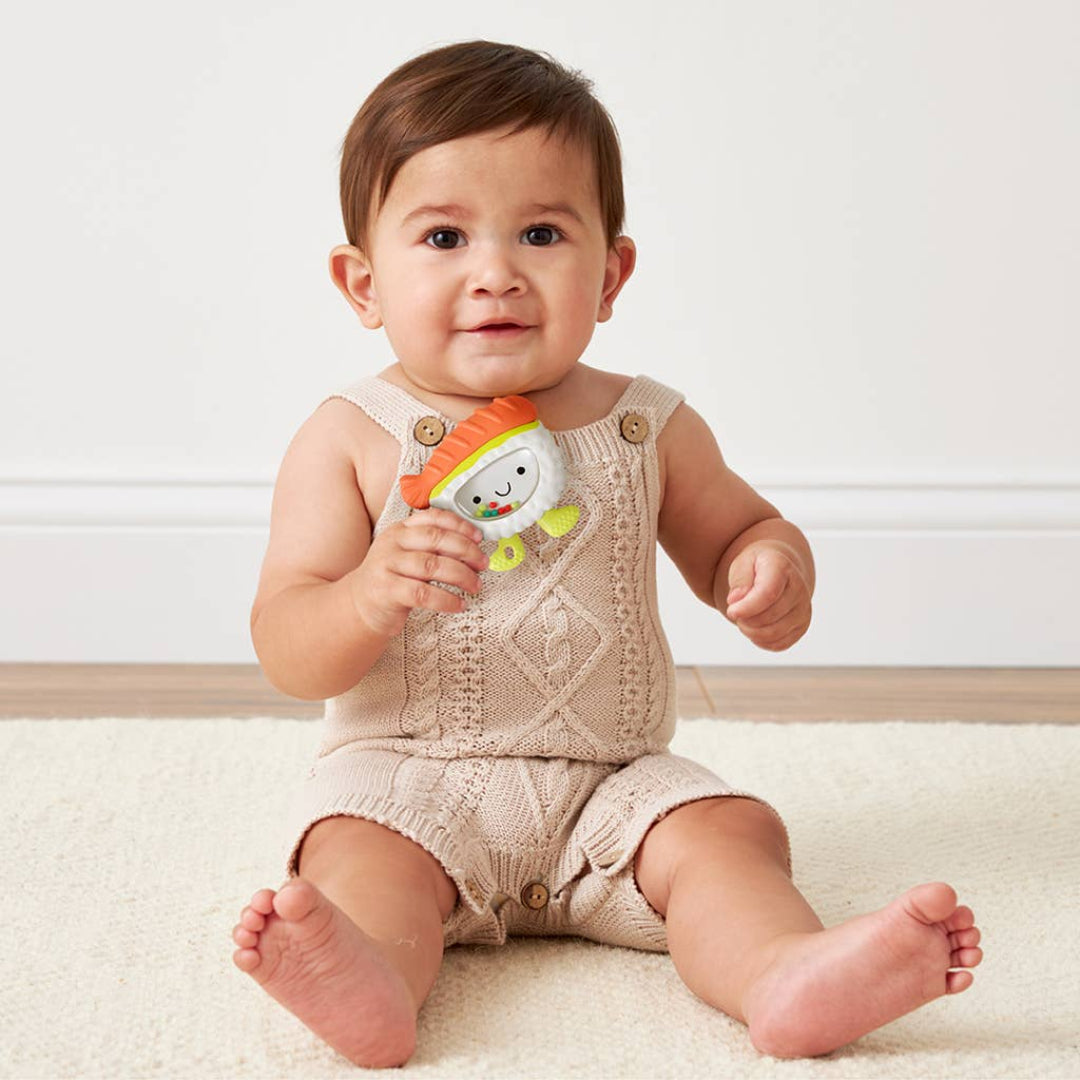 silicone teether rattle shaped like a piece of sushi