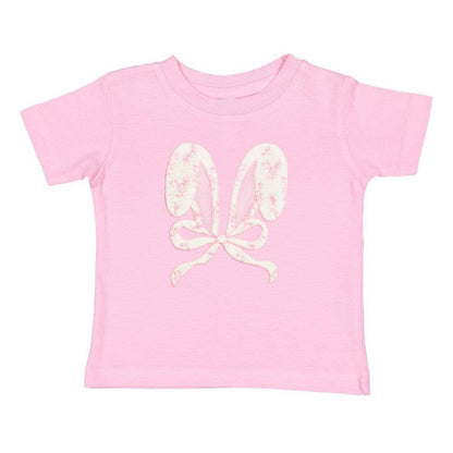Pink t-shirt with white floral butterfly design on a white background