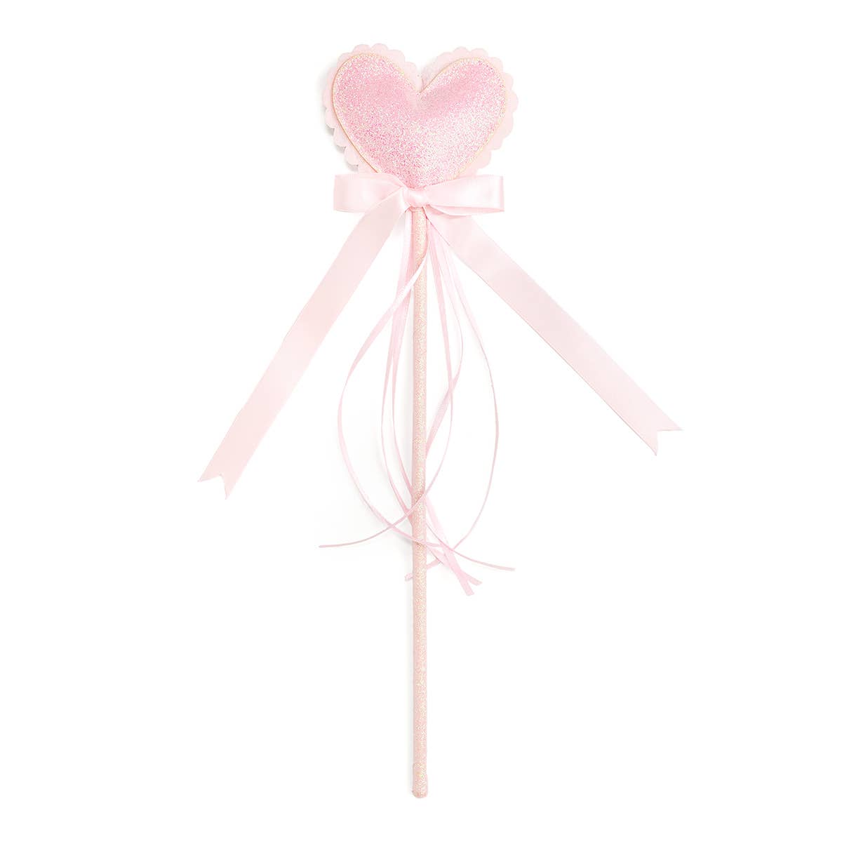 Pink heart-shaped wand with ribbons on a white background