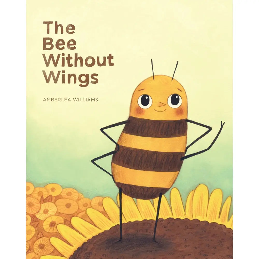 hard cover book with a bumblebee on the front that has no wings and is standing on a sunflower