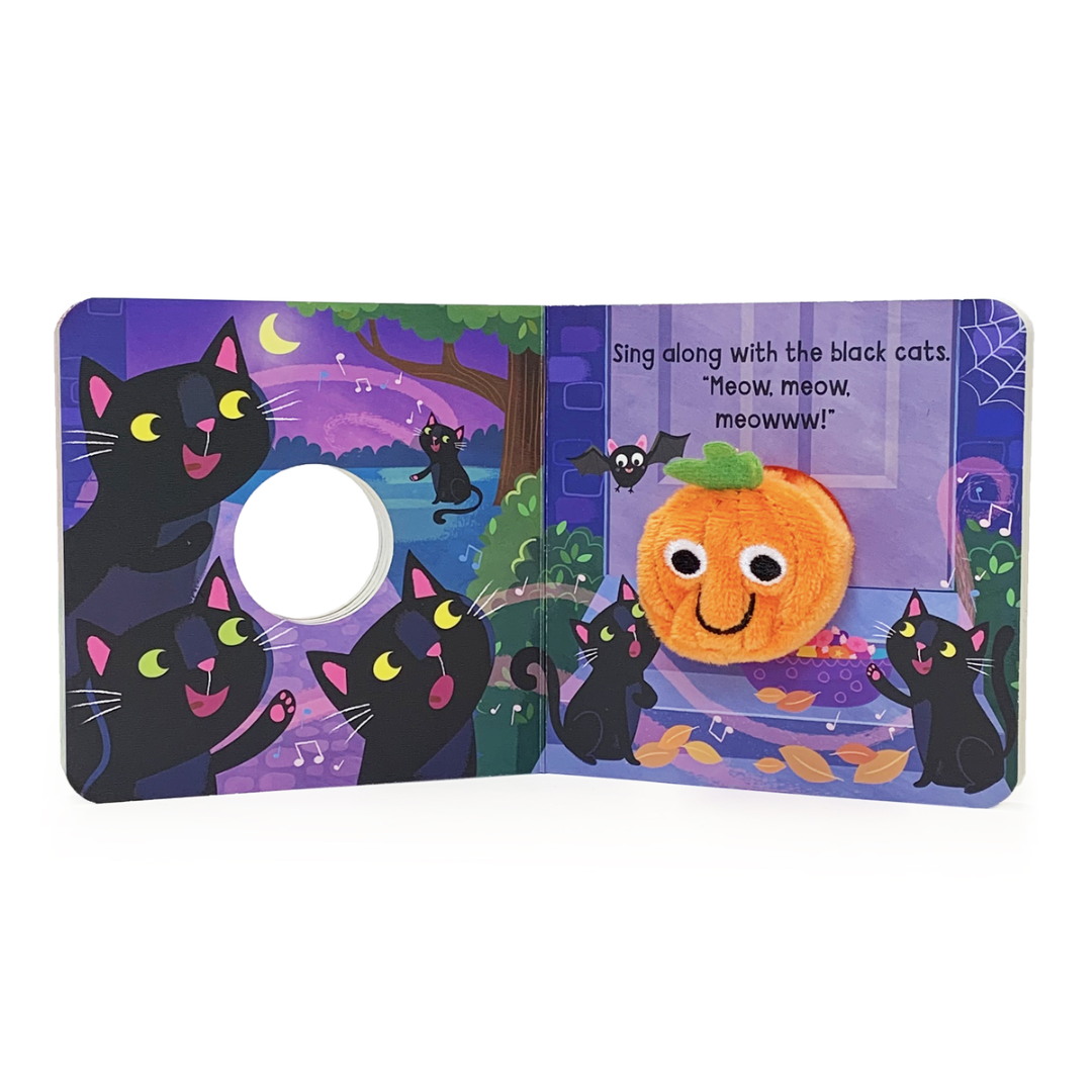 black cats singing along with the pumpkin puppet