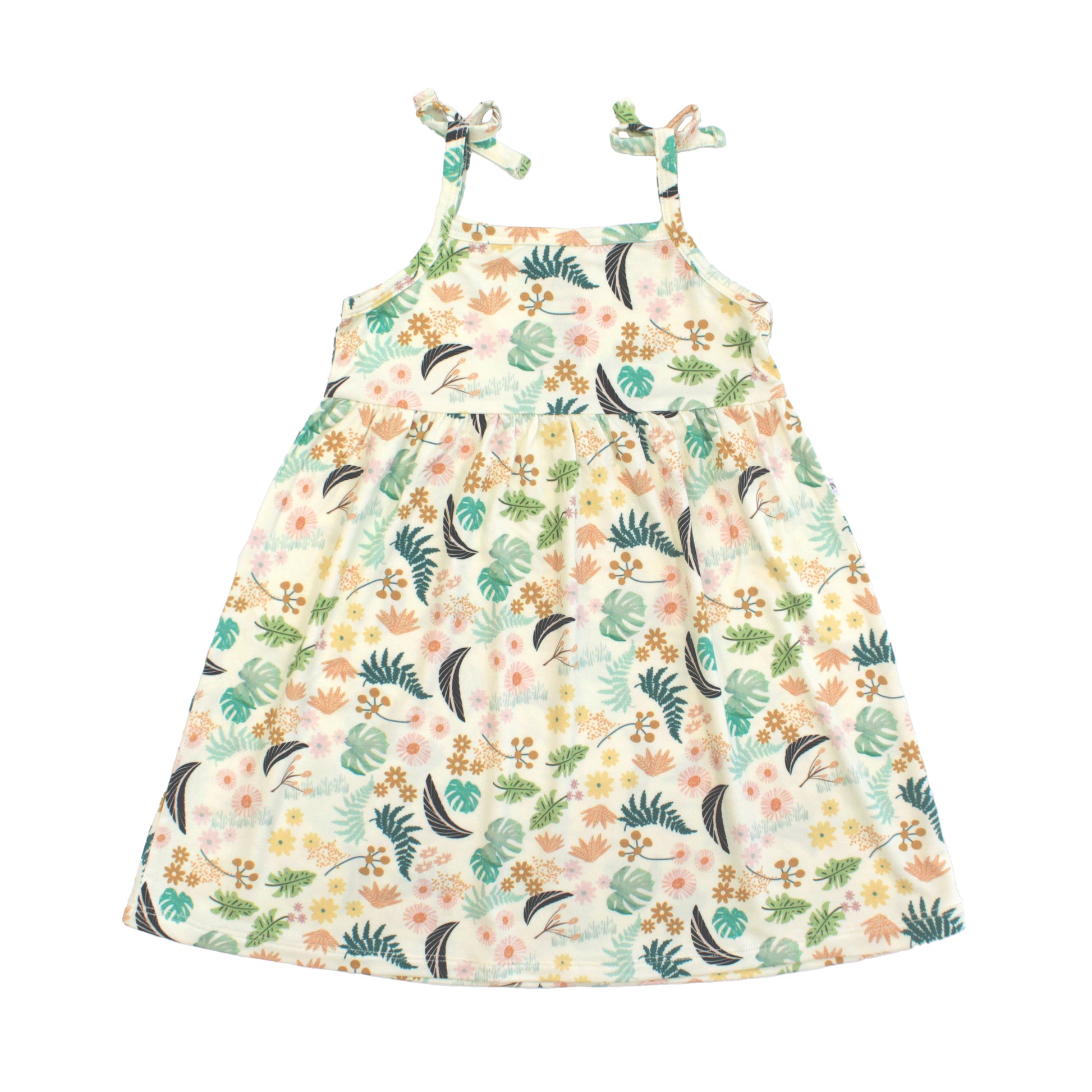 Girls bamboo sundress in the Tropical Blooms floral print featuring spaghetti straps with decorative bows and a flowy skirt.