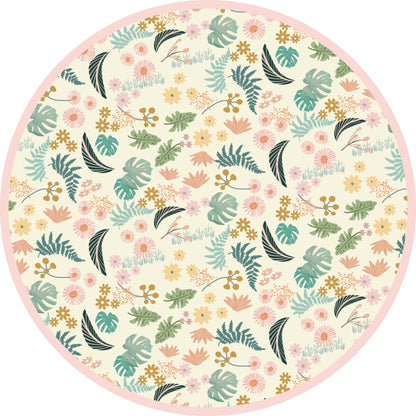 Close-up of the Tropical Blooms print featuring lush green leaves and peach floral blossoms on premium bamboo viscose.