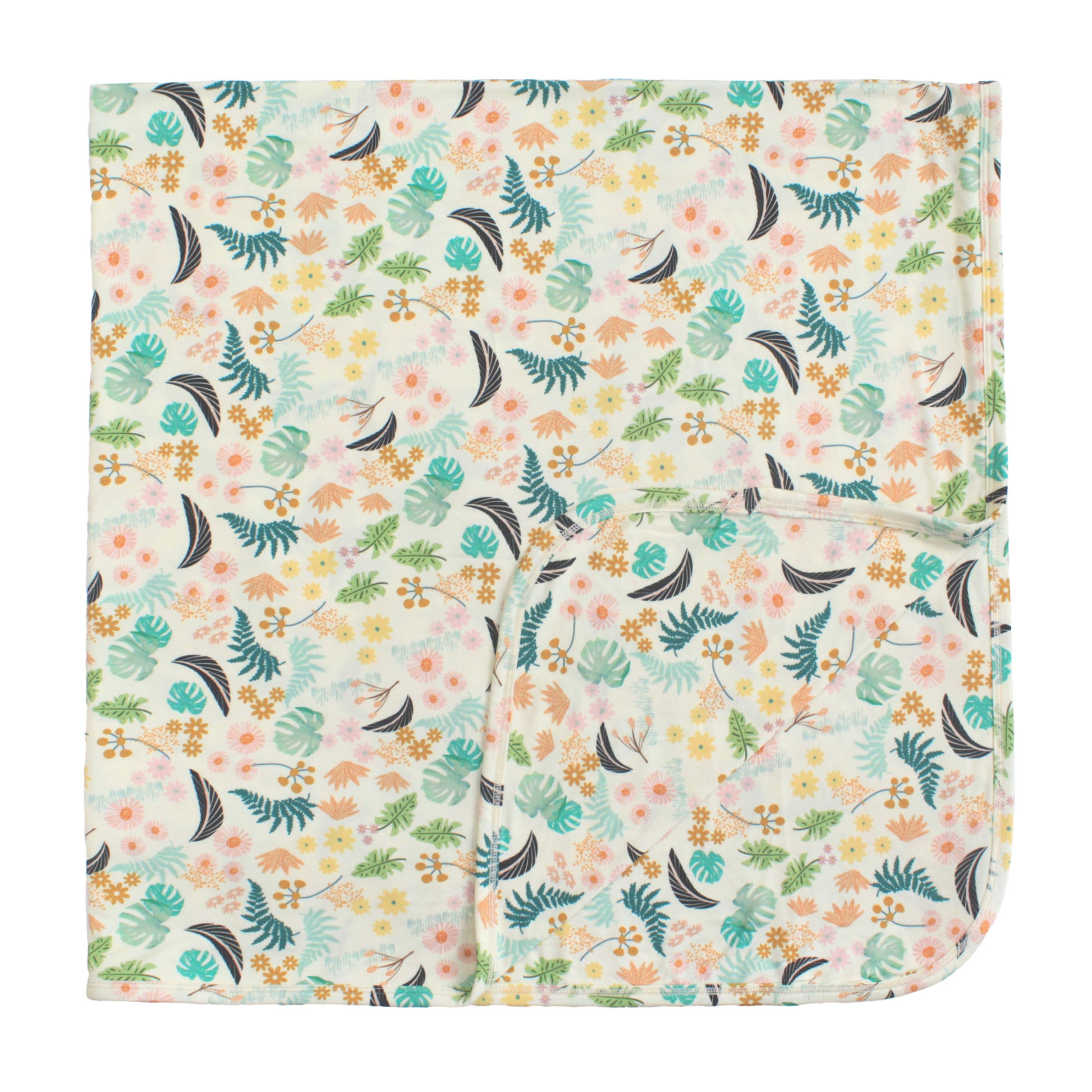 Large double-layered bamboo blanket in the Tropical Blooms print, featuring lush botanical leaves and vibrant florals.