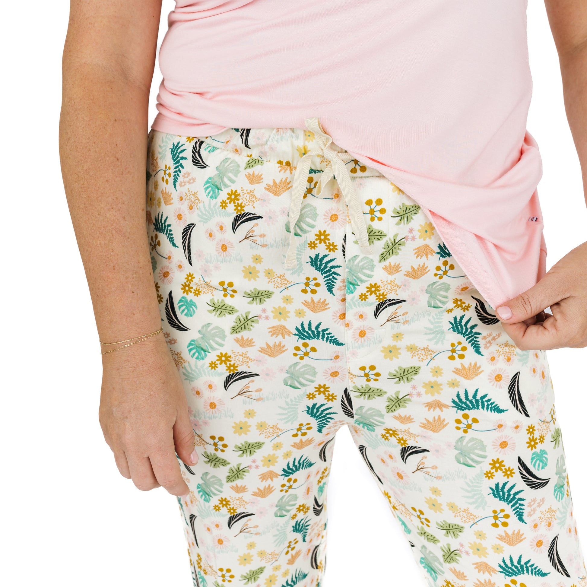Close-up of the Tropical Blooms lounge pants showing the comfortable elastic waistband and drawstring for an adjustable fit.