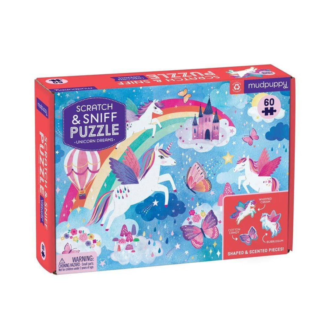 unicorn themed scratch and sniff puzzle in a red box and has a picture of unicorns, a rainbow, a castle, butterflies and a hot air balloon on the front