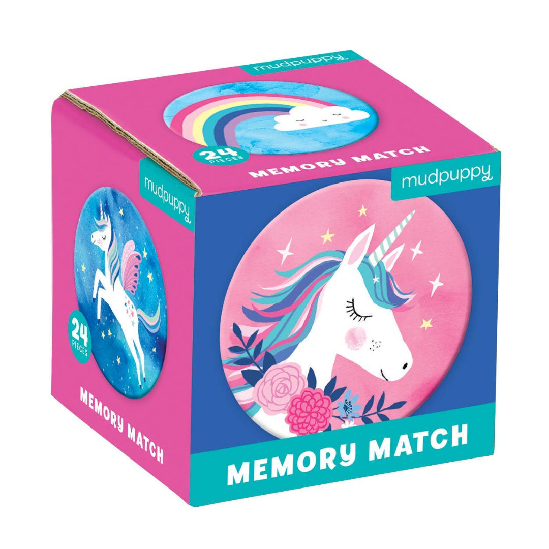 square box thats pink and blue and has pictures of unicorns on the outside, and contains a matching game