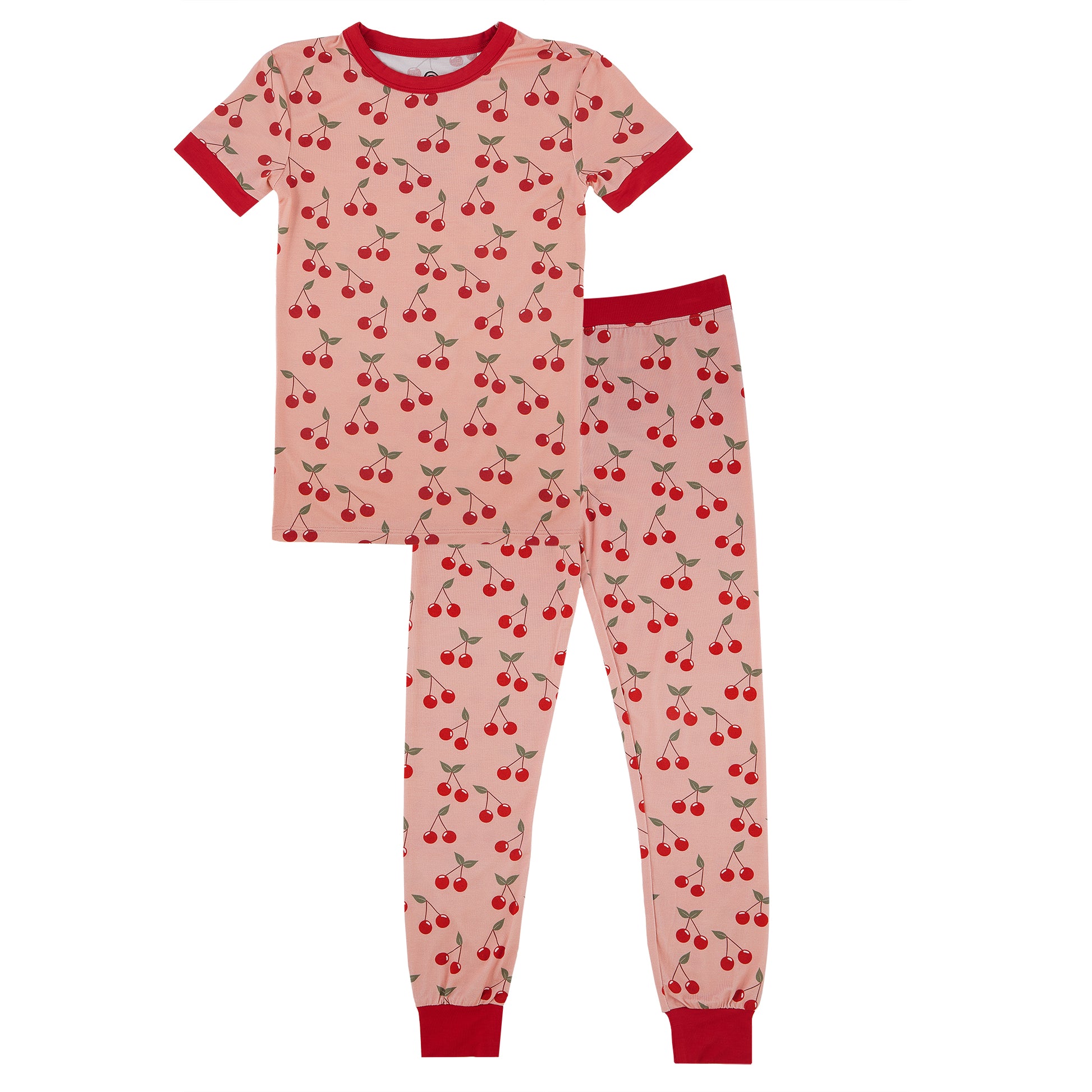 Children's pajama set with cherry pattern on a white background