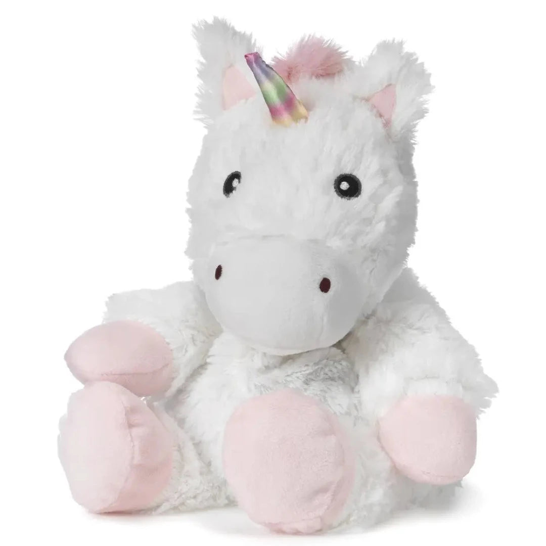 White and pink unicorn plush with a rainbow colored horn