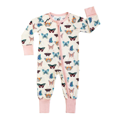 Baby onesie with butterfly pattern and pink accents on a white background