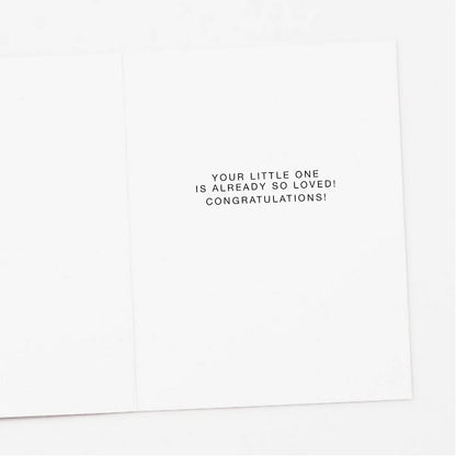 Inside of greeting card that says "your little one is aready so loved! congratulations"