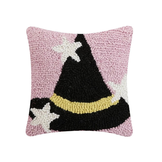 Square pink halloween pillow with a black witch hat and white stars