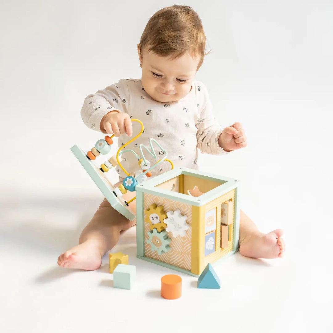 wooden activity cube