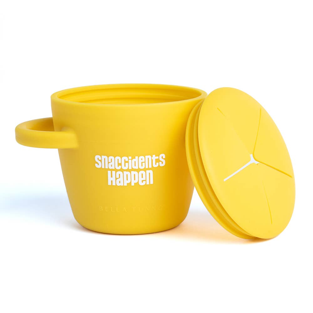 Yellow silicone snack container with a lid on a white background