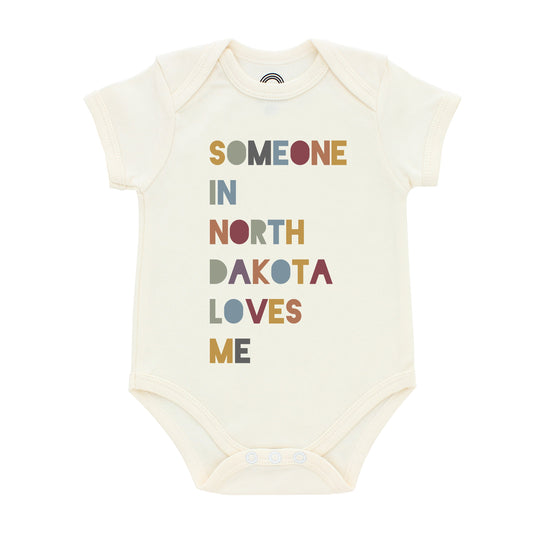 Someone in North Dakota Loves Me Short Sleeve Baby Onesie